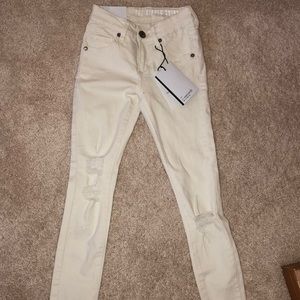 Cream-white colored Jeans